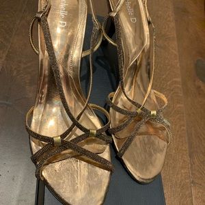 Absolutely beautiful never used  bronze gold 3” delicate sandals!